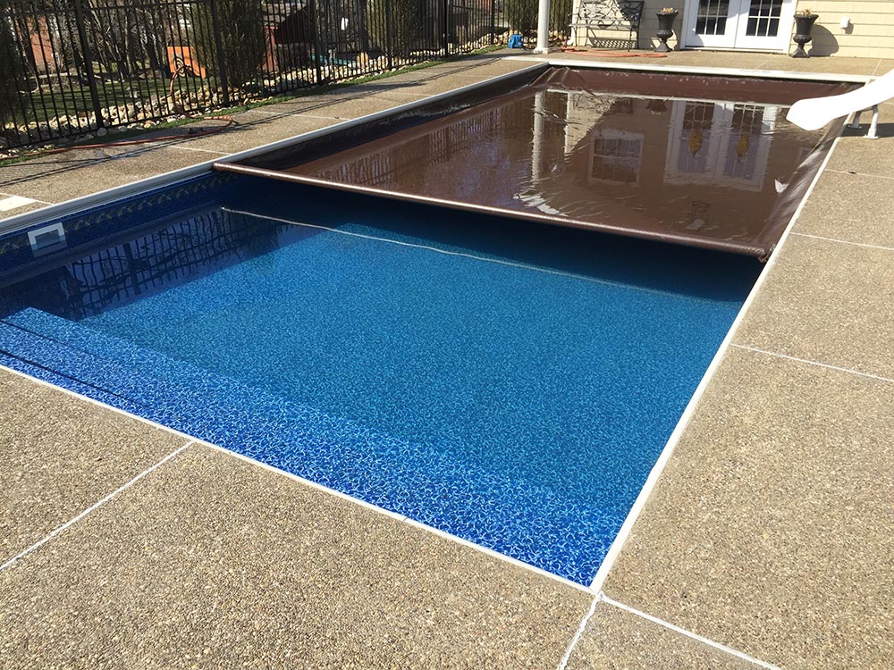 AUTOMATIC POOL COVERS